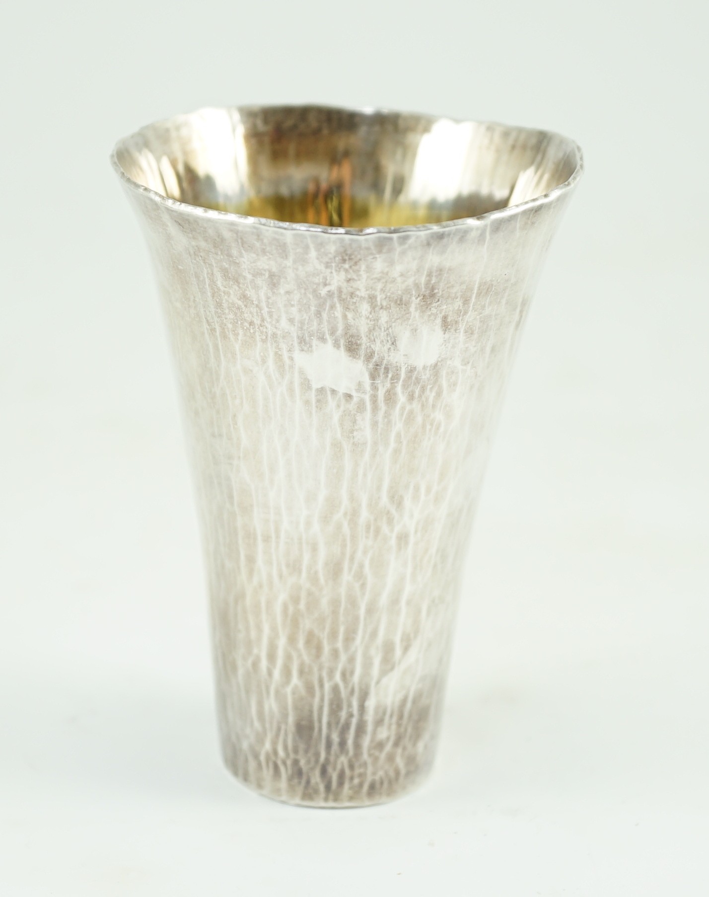 A modern Britannia standard planished silver cup, by Malcolm Appleby